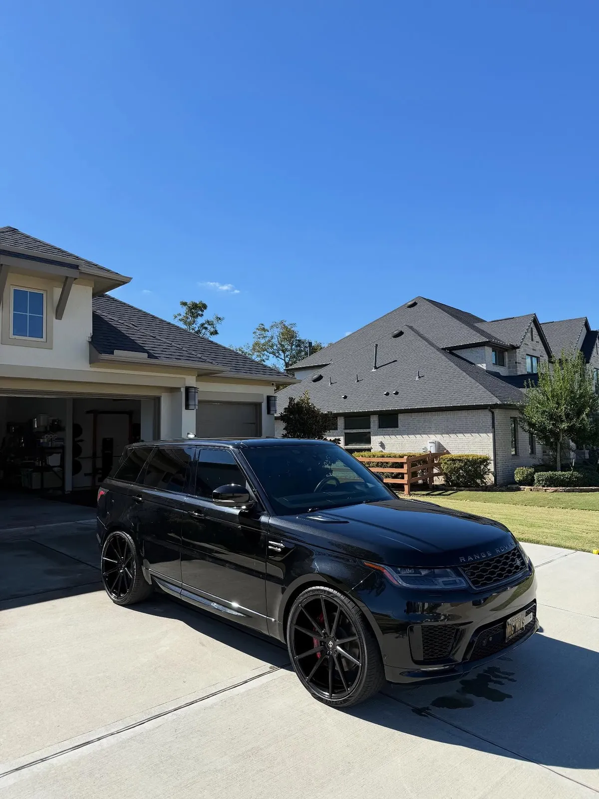 Black Range Rover Sport with a deep gloss finish