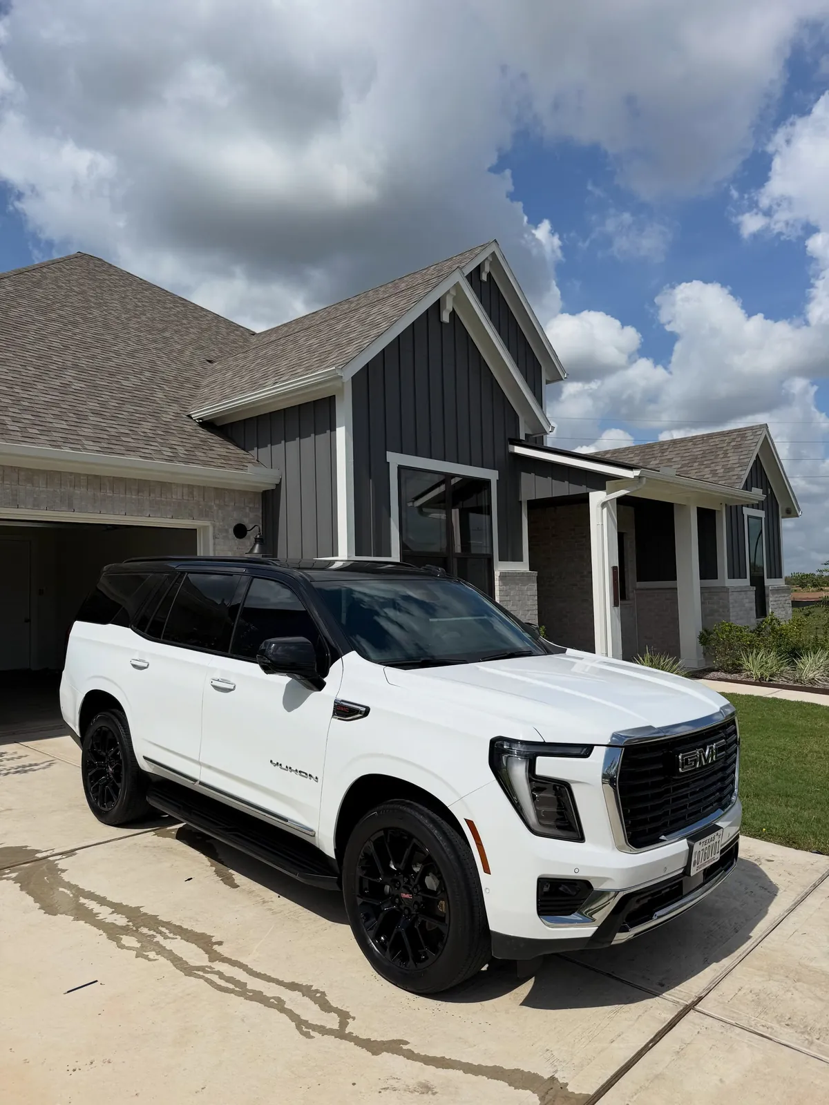 White GMC Yukon after an exterior detail